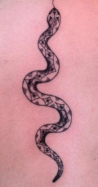 Caring For A Snake Spine Tattoo